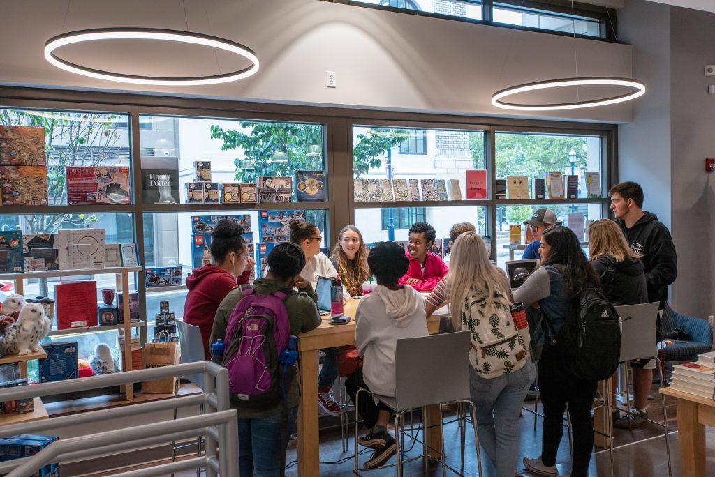 Students socializing at the Uconn Hartford Bookstore and Starbucks on Sept. 26, 2018. (Sean Flynn/UConn Photo)
