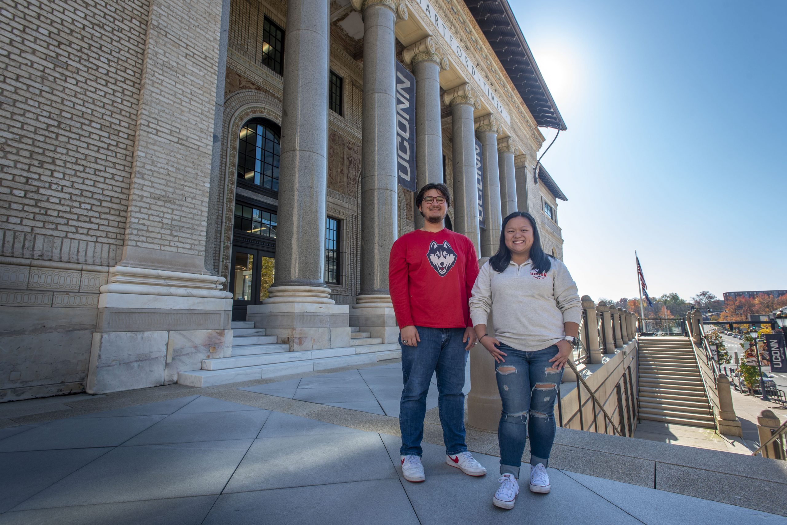 Andrew Lanza and Andrea Ybanez in front of the Hartford Tmes Building at UConn Hartford. Nov. 3, 2022. (Sean Flynn/UConn Photo)