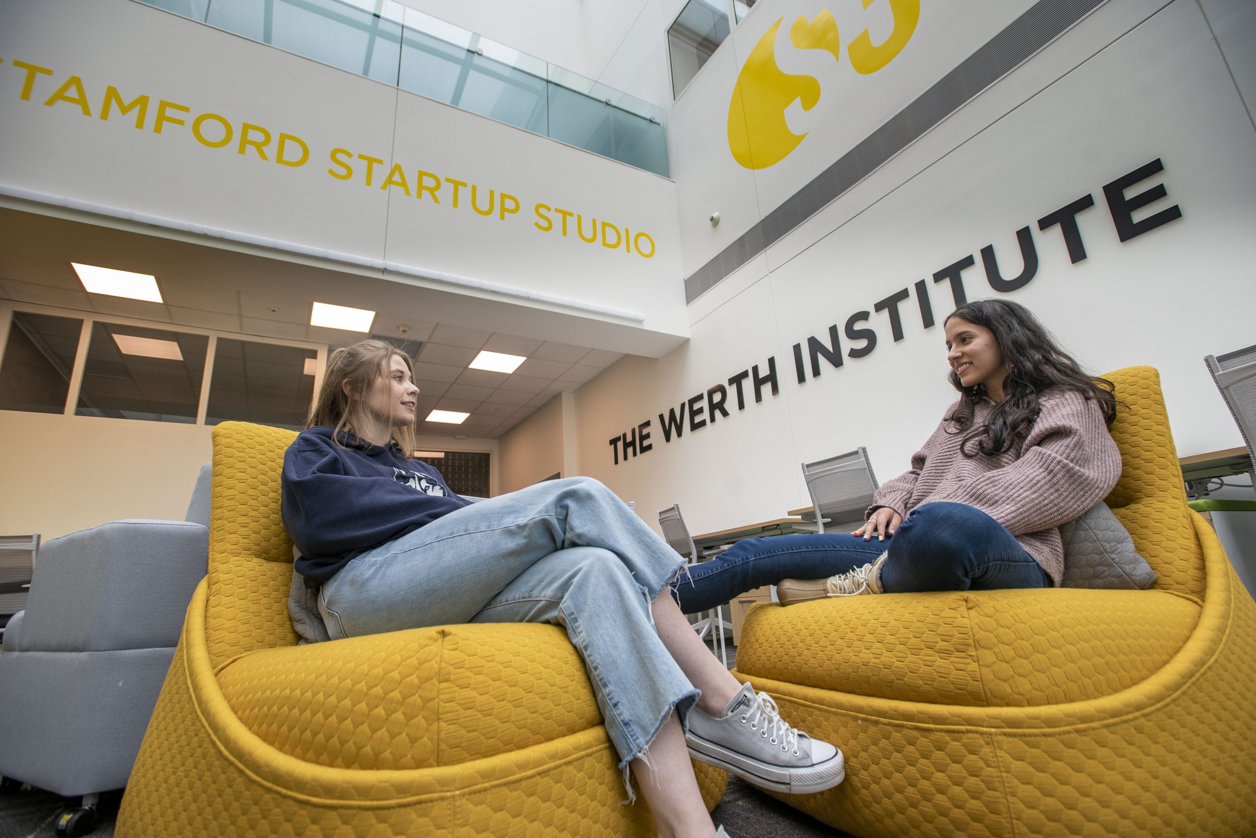 UConn Stamford students talking at the Werth Institute SuiteApril 6, 2022