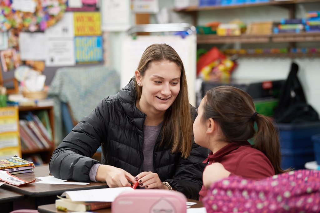 Leah Bemis '12 (CLAS) meets with fifth-grader Grace Morenus during Big Brother/Big Sister outreach 