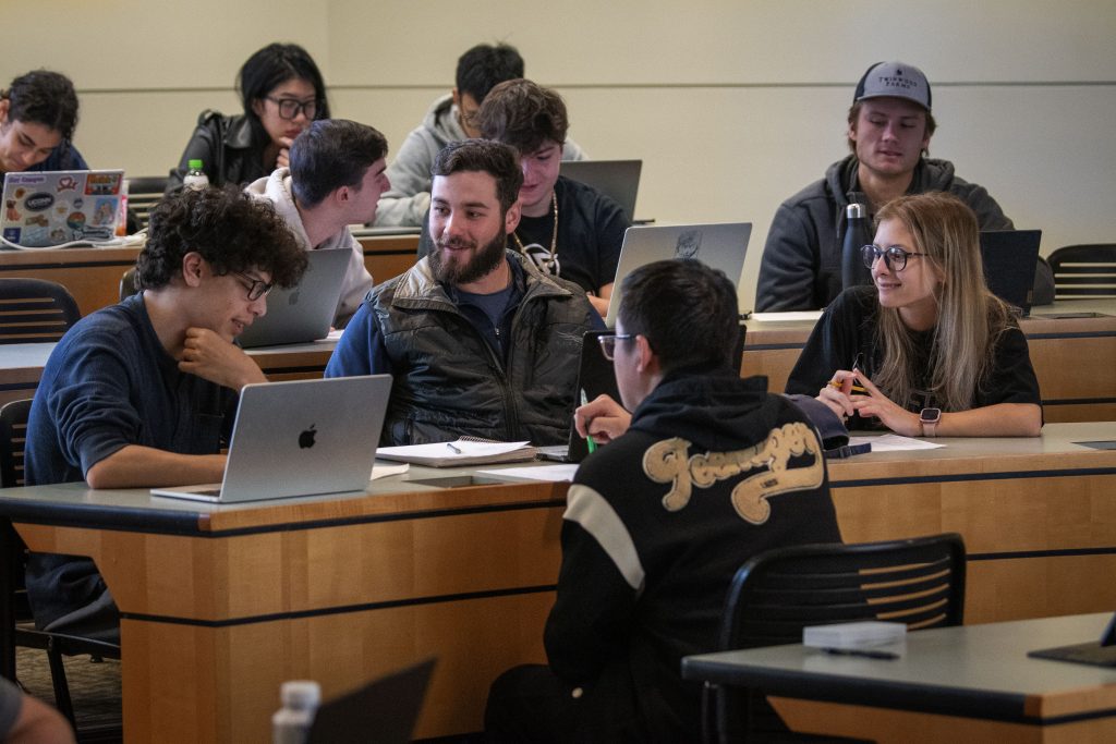 Students in a School of Business classroom on Nov. 6, 2023. (Sean Flynn/UConn Photo)